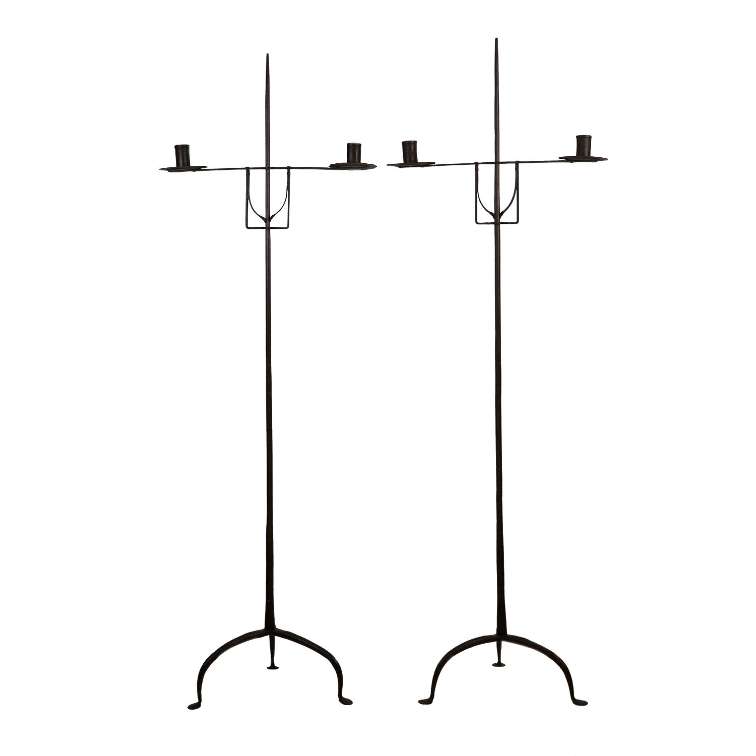 A pair of 17th century iron floor candlesticks, possibly North American