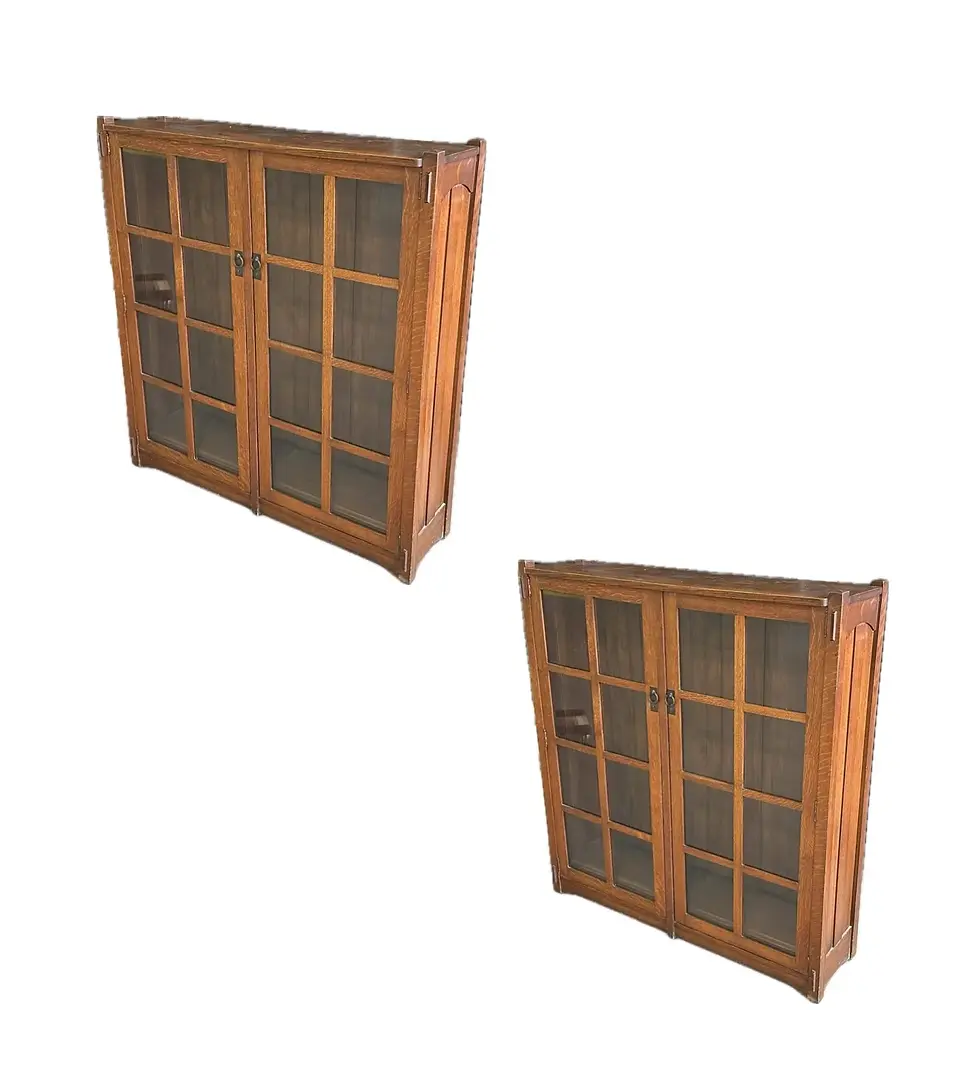 A pair of Stickley Brothers mission oak bookcases model 4772 circa 1912