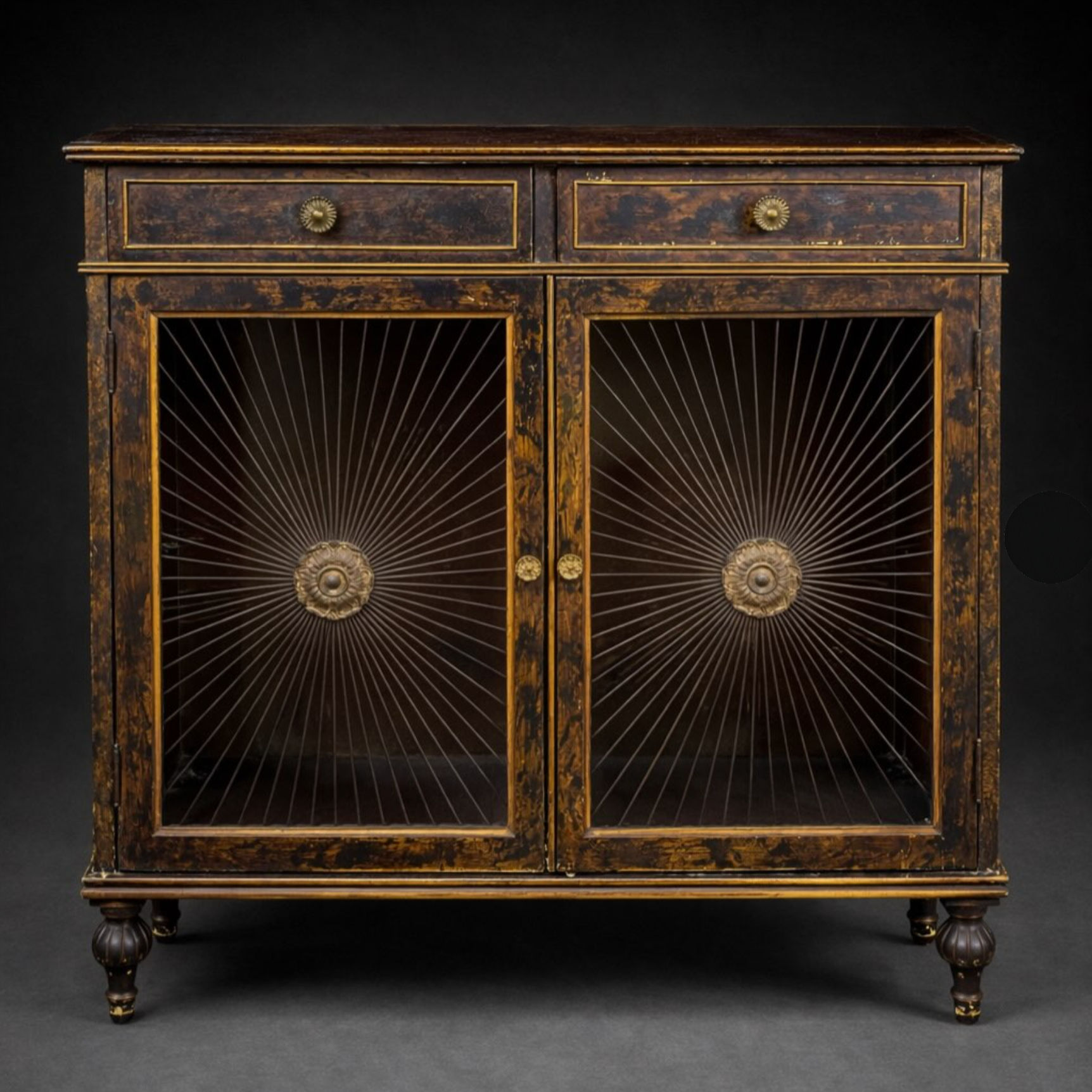 An attractive English Regency style faux tortoiseshell side cabinet