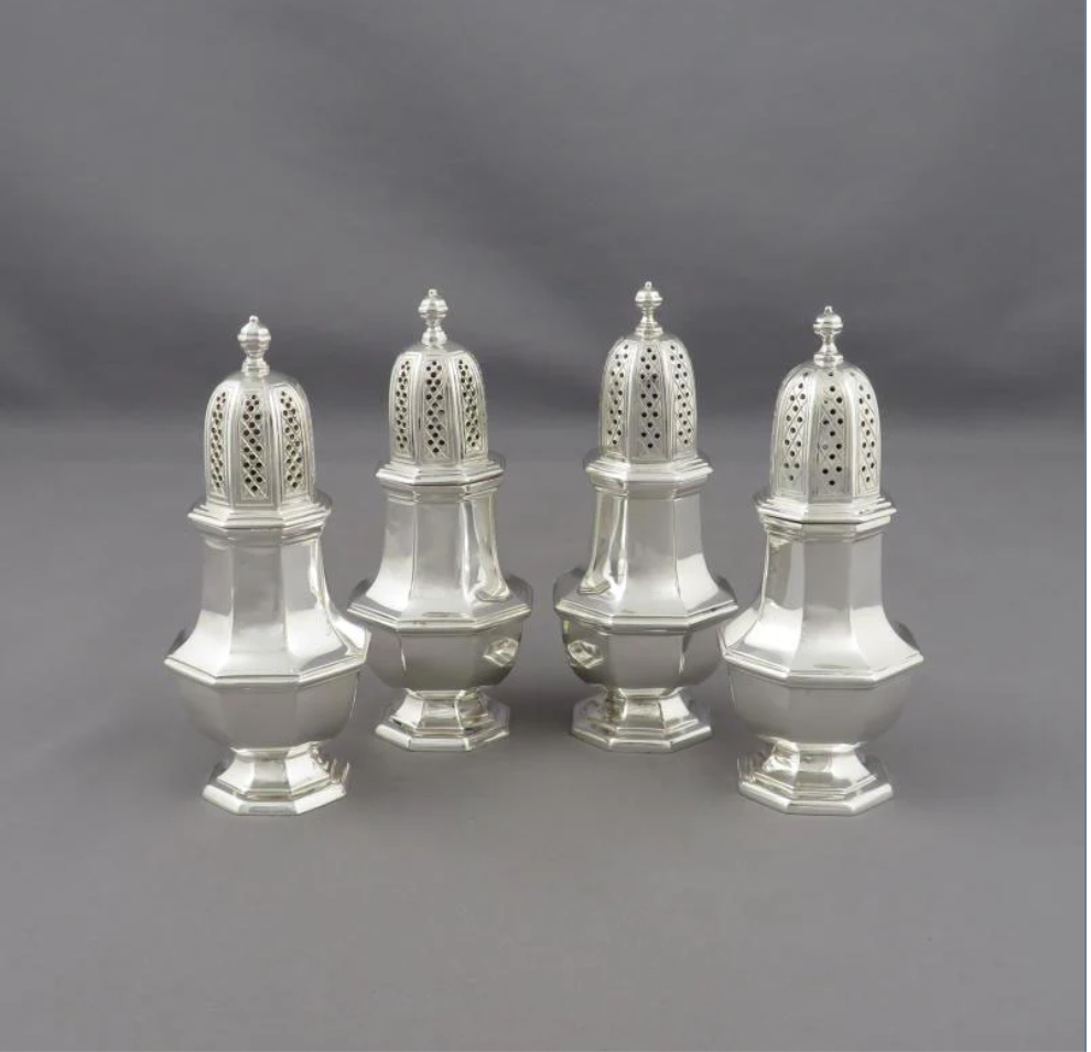 An assembled set of 4 fine George II style sterling pepper shakers 1951-72