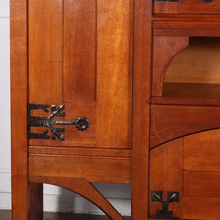 Thumbnail: An incredibly rare French Arts & Crafts oak & leather bookcase by Henri Rapin