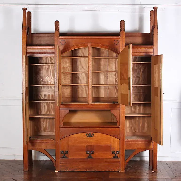Thumbnail: An incredibly rare French Arts & Crafts oak & leather bookcase by Henri Rapin