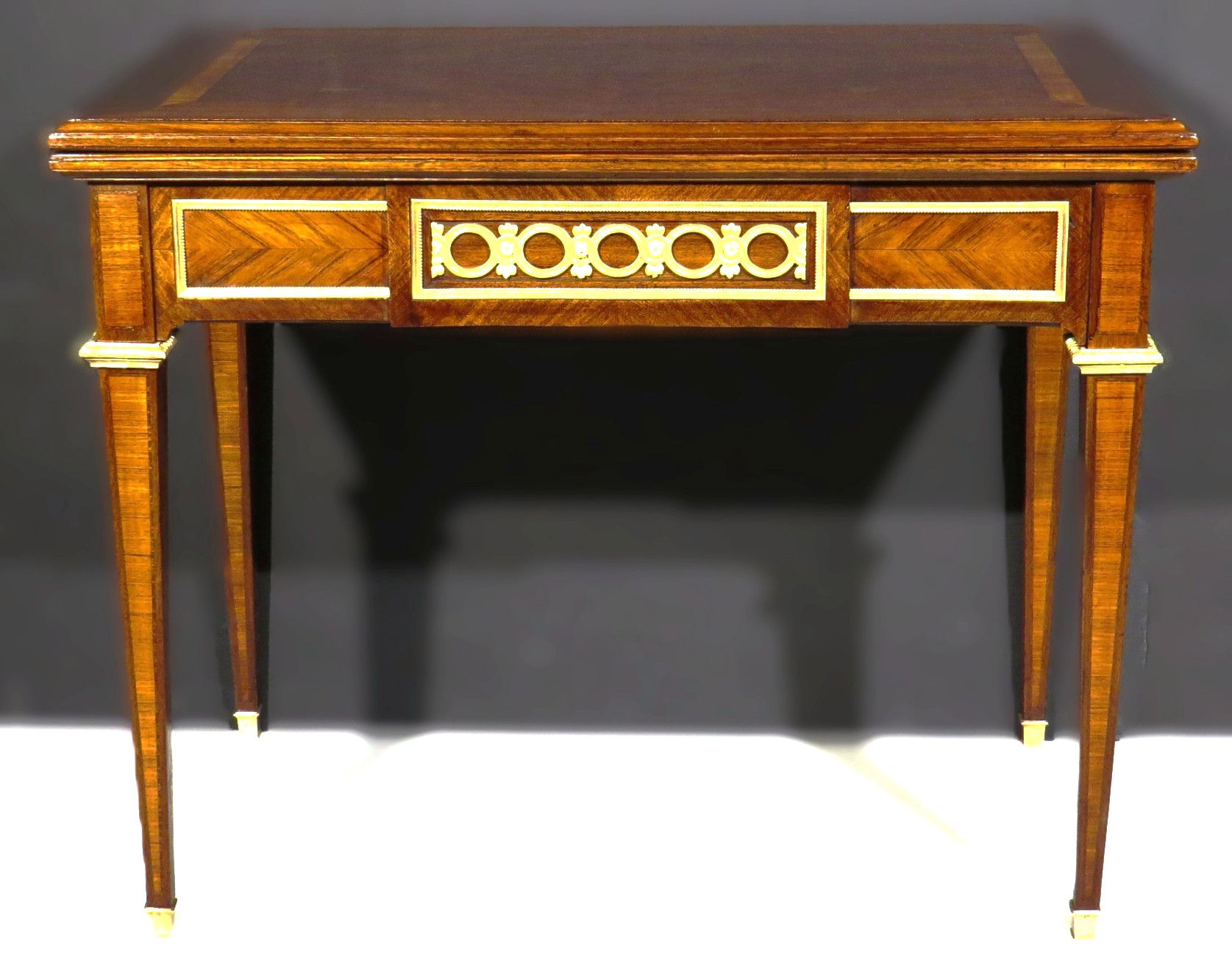 A very fine French 20th C Louis XVI style mahogany 'tric trac' games table c1920