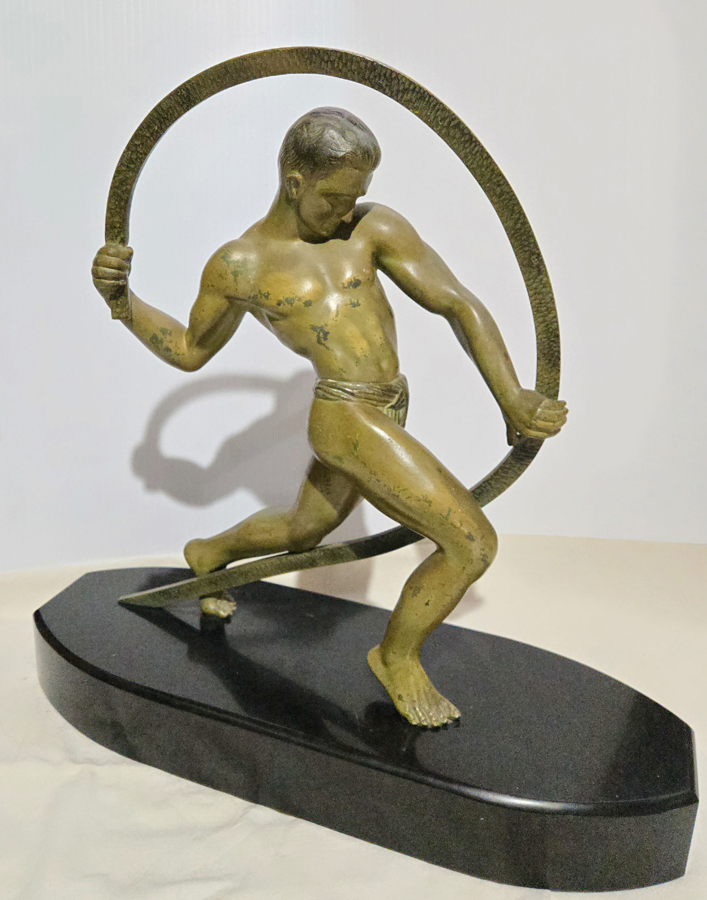 An Art Deco bronze figure of an athlete, by Salvatore Riolo / Kowas (1905-1955)