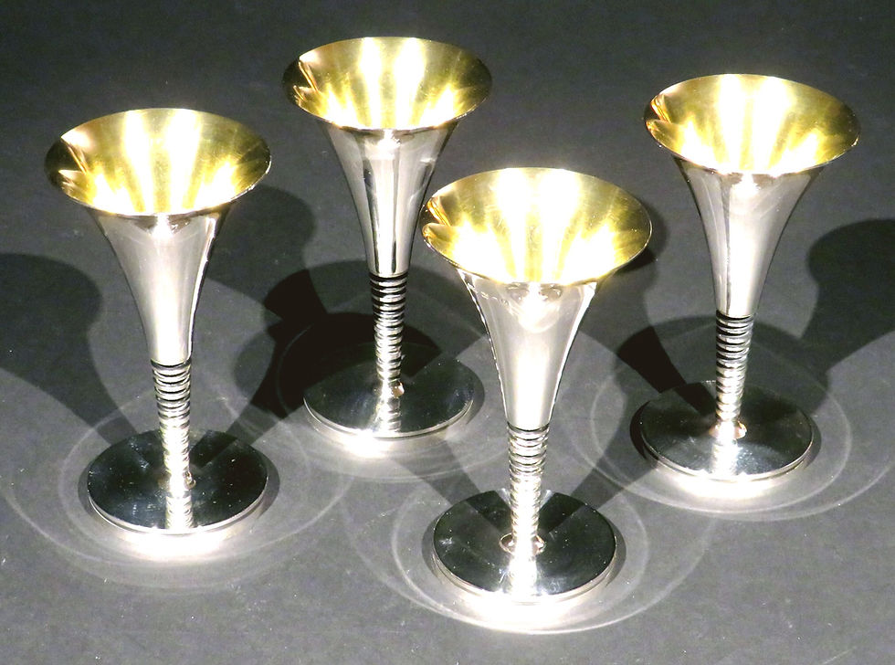 Thumbnail: A rare set of four sterling silver champagne flutes by Robert May