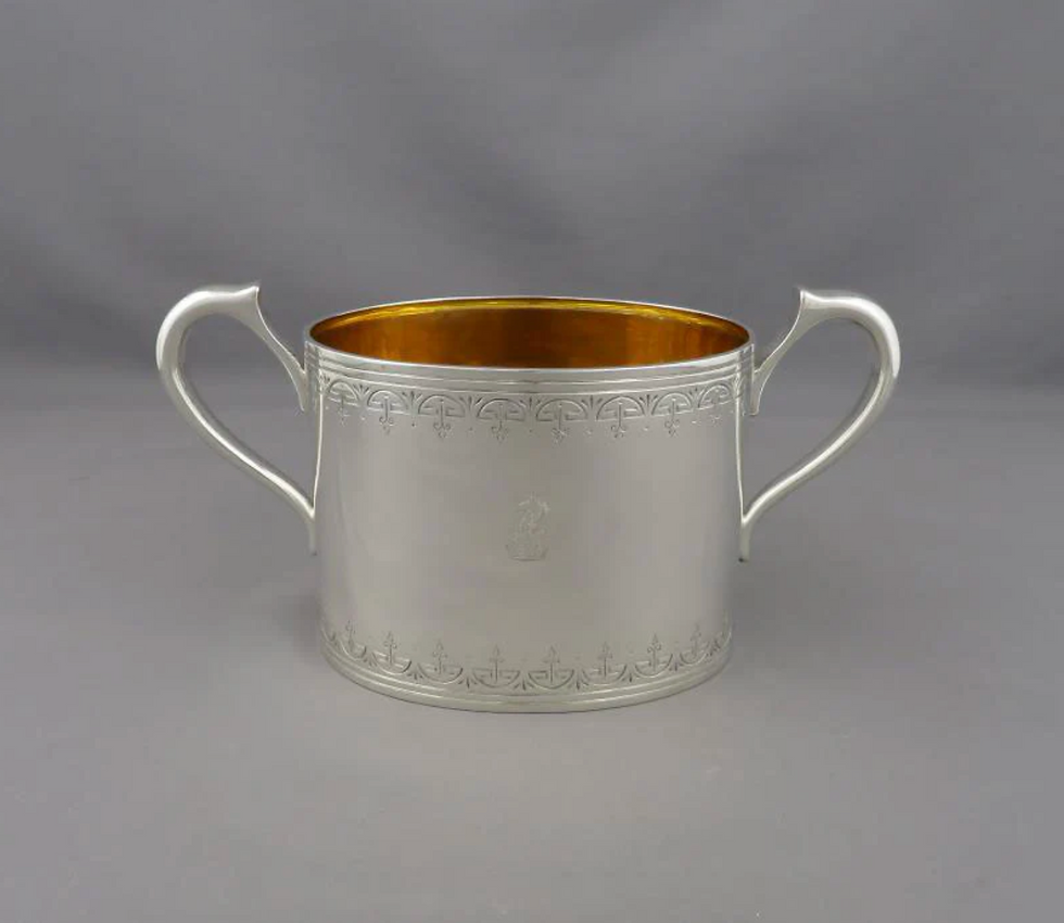 Thumbnail: A Victorian silver tea set with gilt interiors, Garrard II, London 1879 & 1885