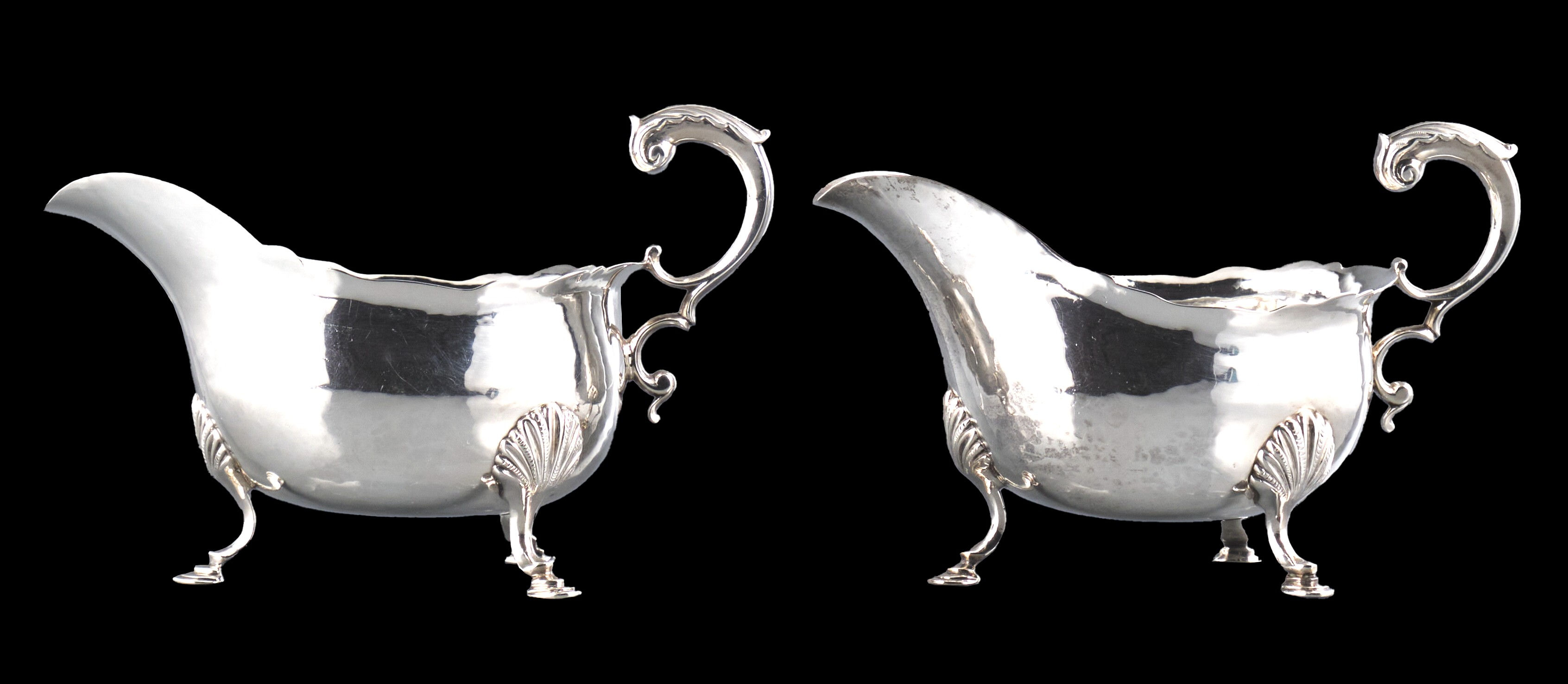 A fine pair of 18th C George III sterling silver sauce boats, London 1762