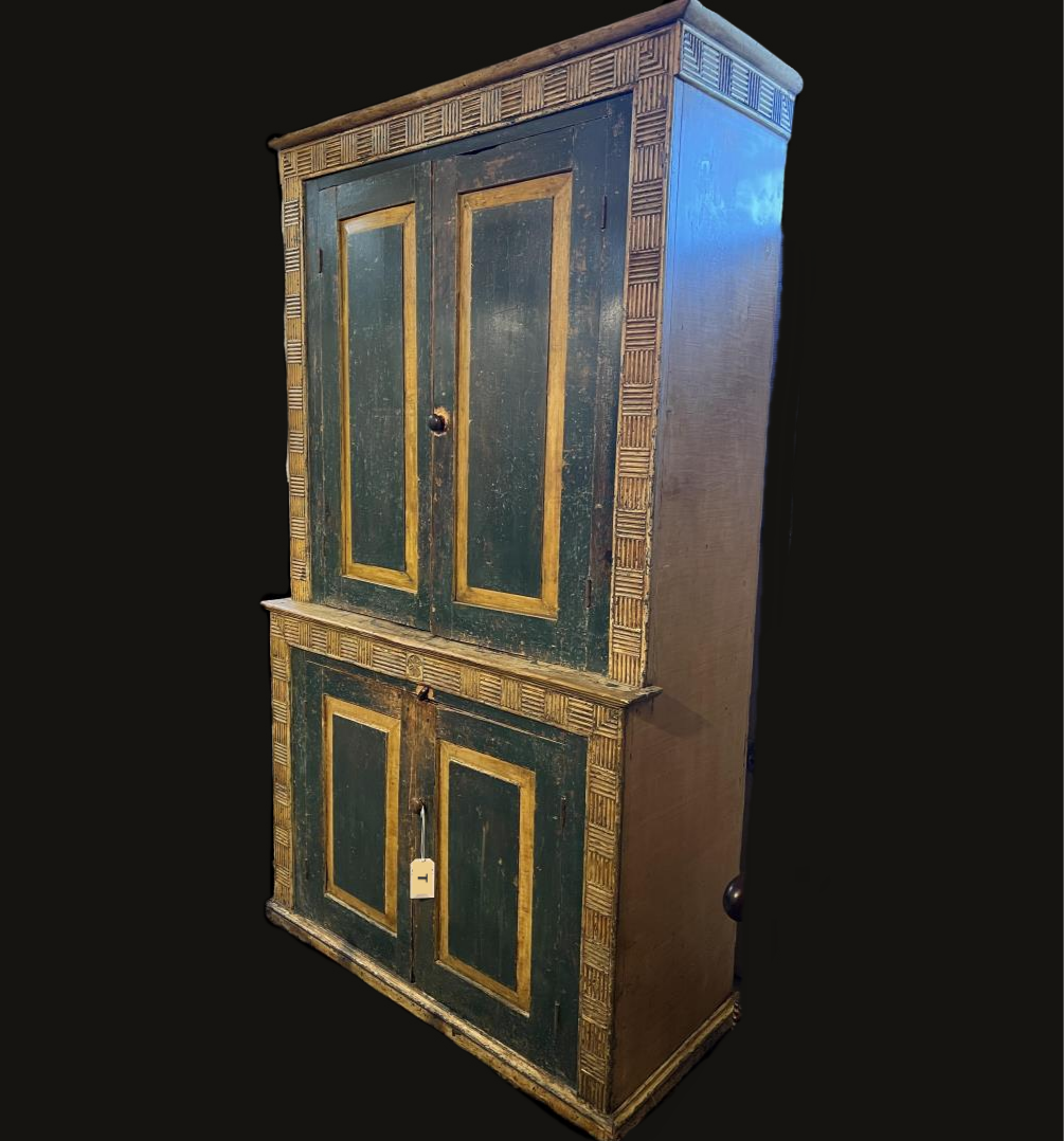 A mid 19th C Canadian four-door painted armoire, Quebec or Eastern Ontario