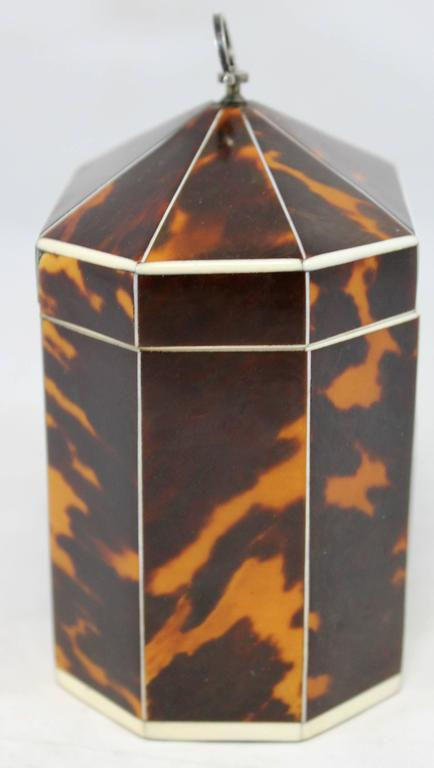 Thumbnail: An extremely rare & fine George III octagonal tortoiseshell tea caddy