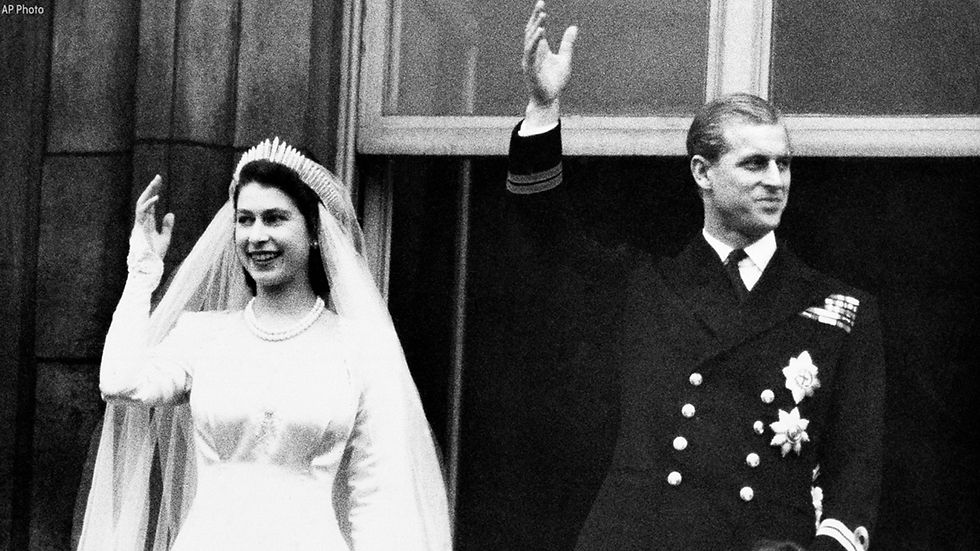 After the ceremony, Elizabeth and Philip then proceeded to Buckingham Palace, where the couple waved to the crowds from the balcony.