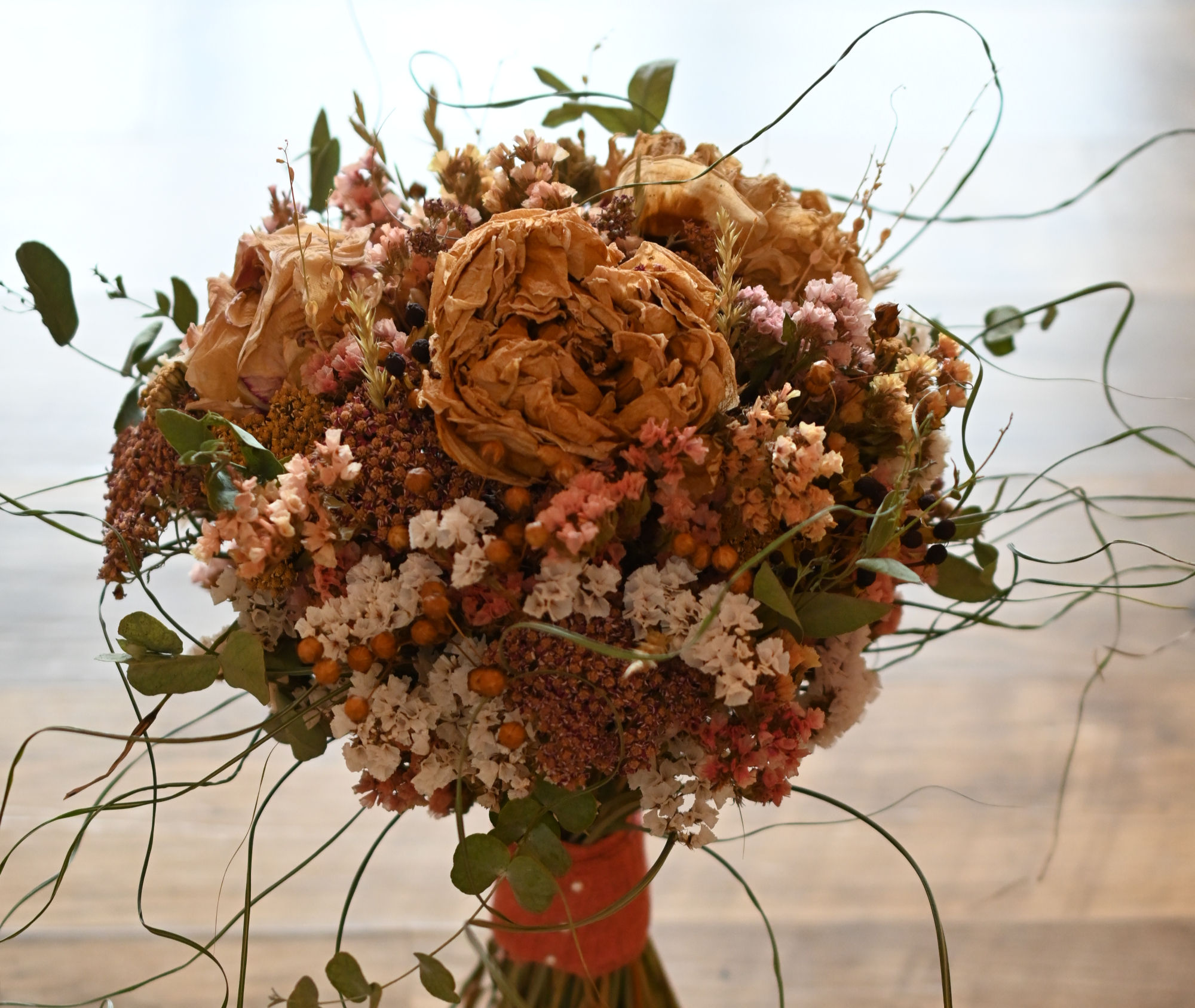 Muted and Colourful Dried Flower Bouquets - Paper Wrapped