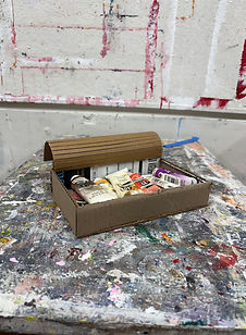cardboard mock up for modular storage system built specifically for artist