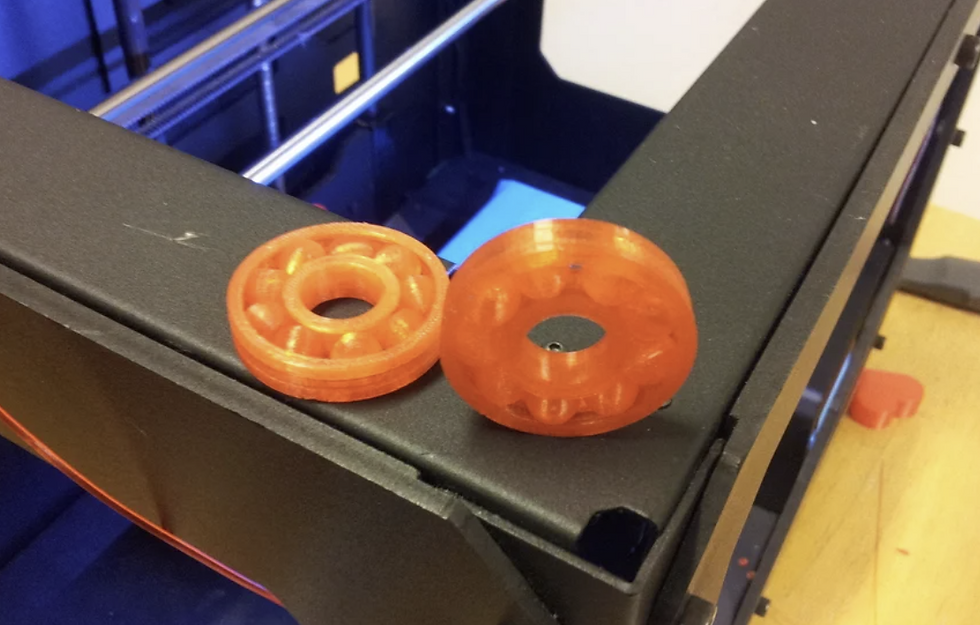 Print In Place Ball Bearing Printed Using FDM with Opaque Orange Filament