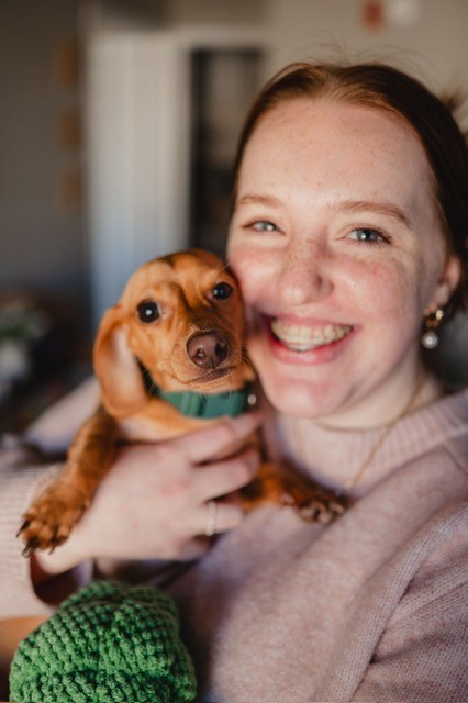 Riley with her wiener dog named Alfredo
