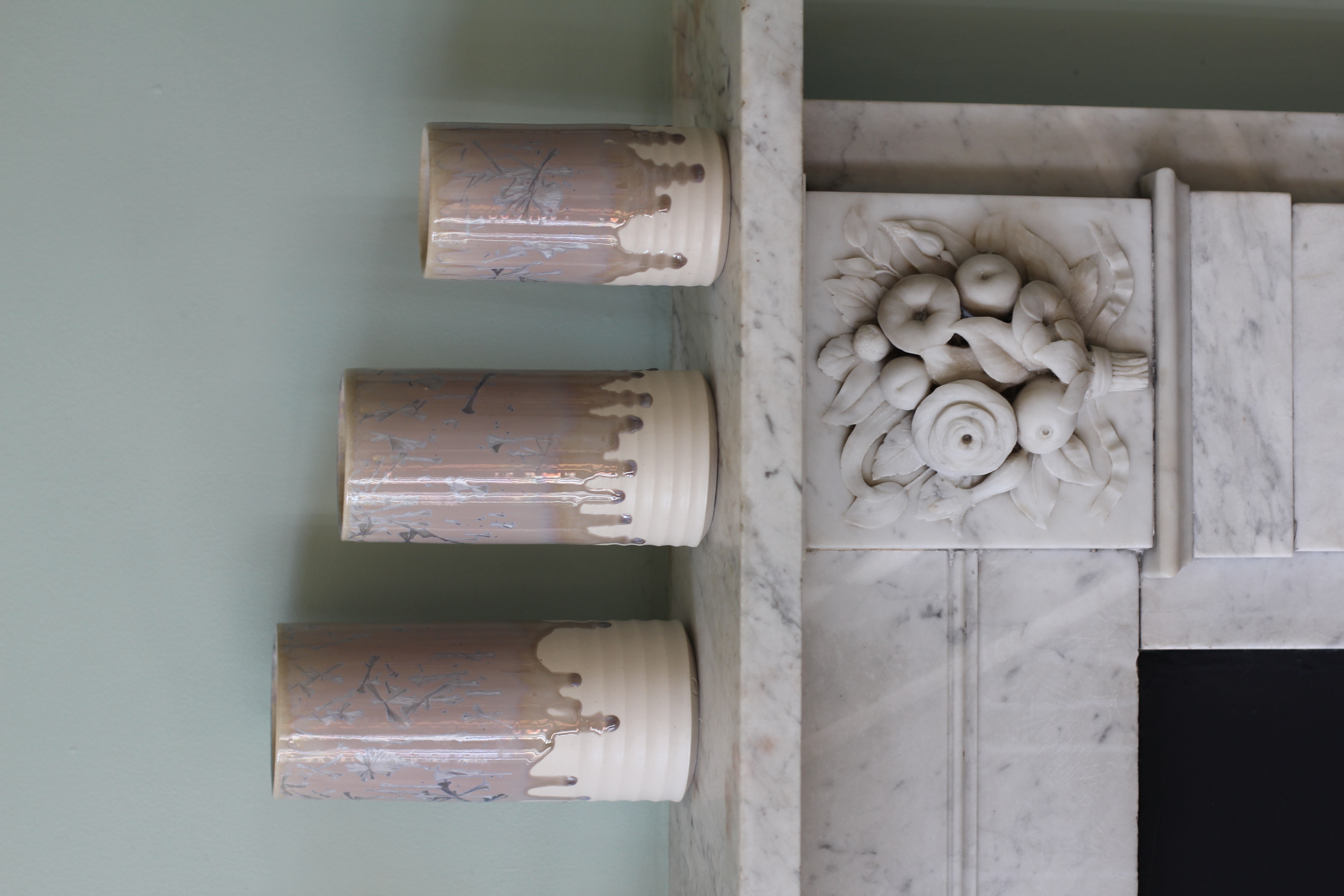 Three crystal glazed cylinder forms