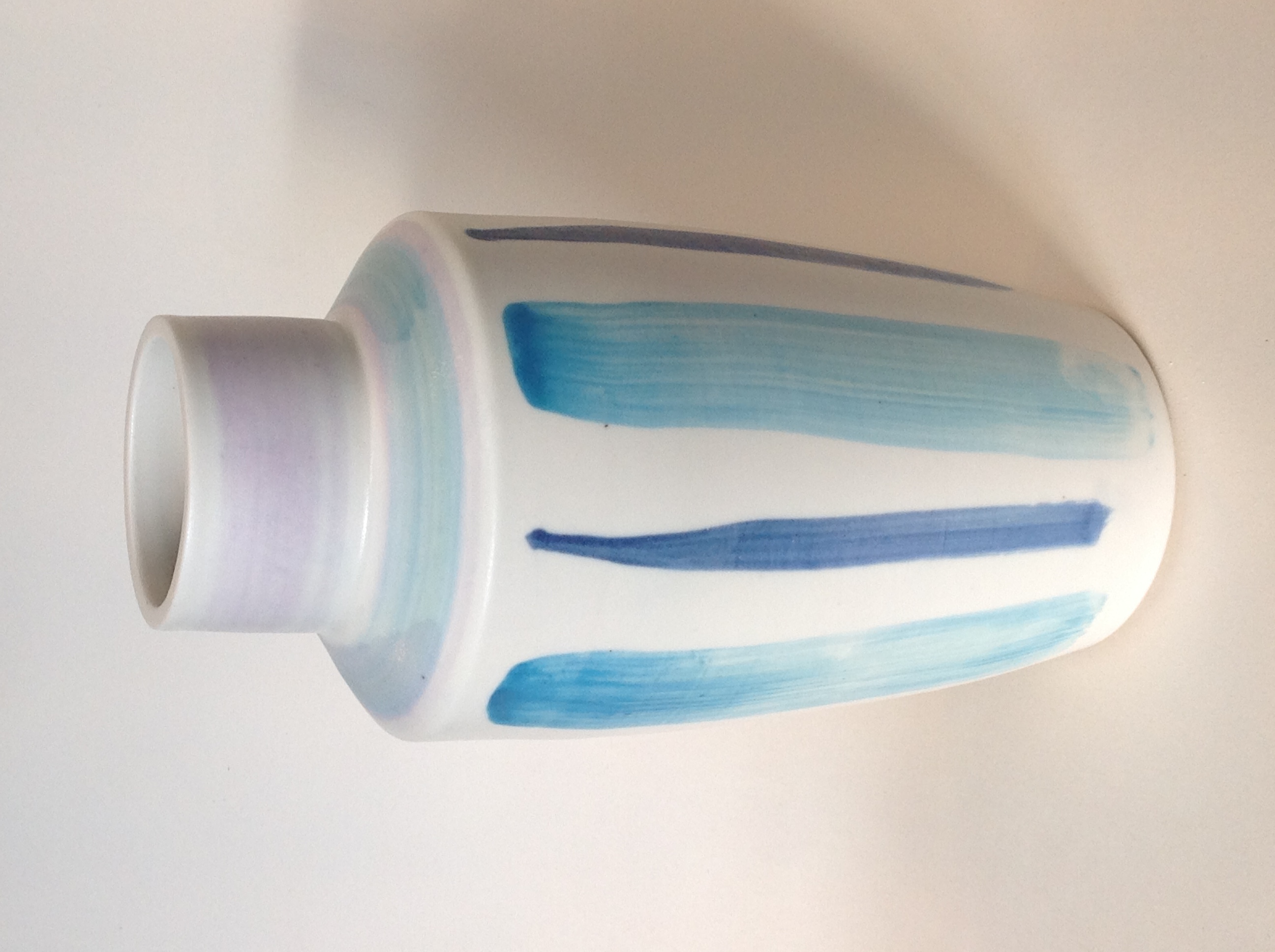 Hand thrown porcelain with painted surfa