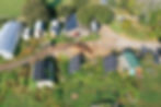 Aerial view of house with rooftop solar panels