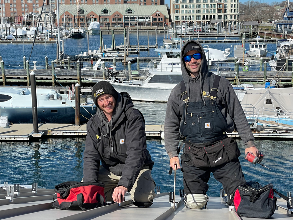 Newport Solar Crew preparing to install panels