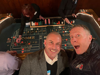 Two men playing craps, casino night fun