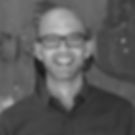 Smiling man wearing glasses