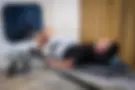 Young man doing leg presses