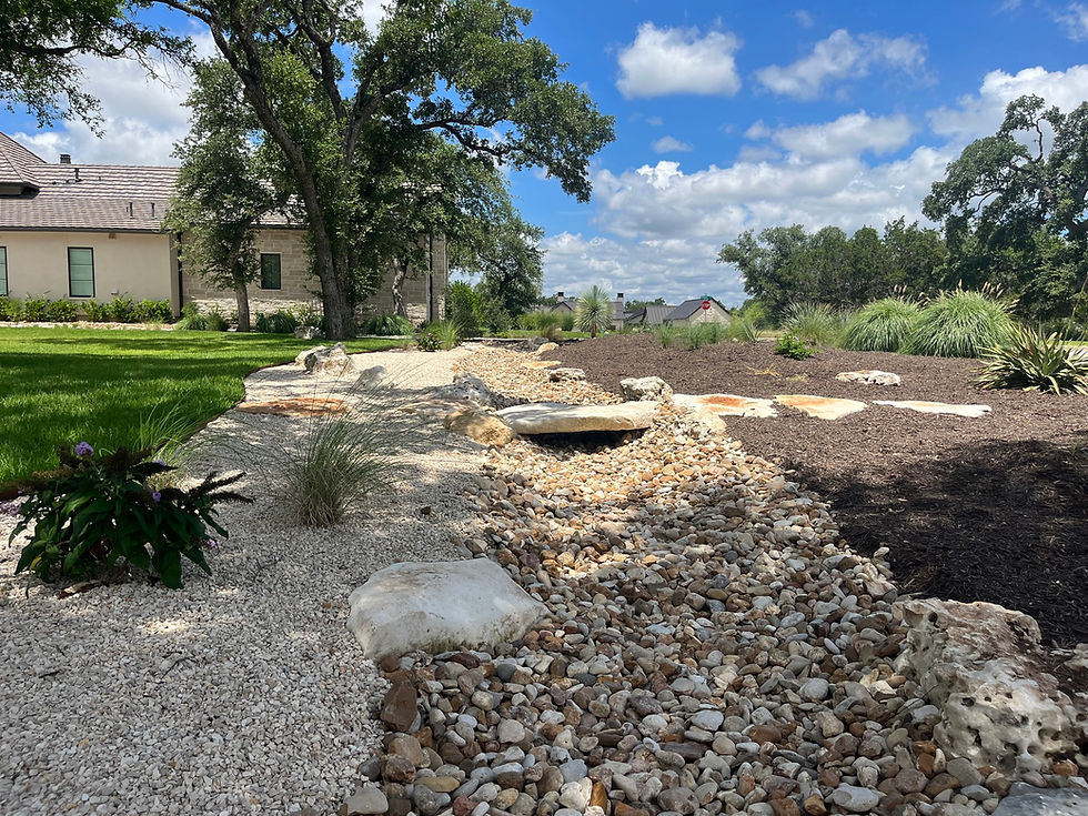 Landscaped garden with dry creek bed and stone path