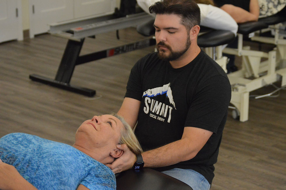 Orthopedic therapist treating a patient's neck