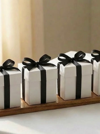 white boxed favour with black ribbon