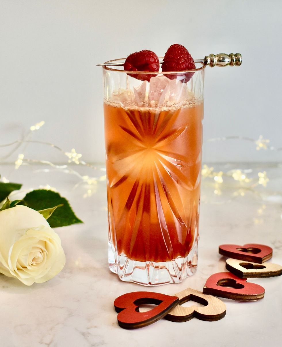 high ball glass filled with Pimm's rose cup cocktail. photo by Arlee Henderson