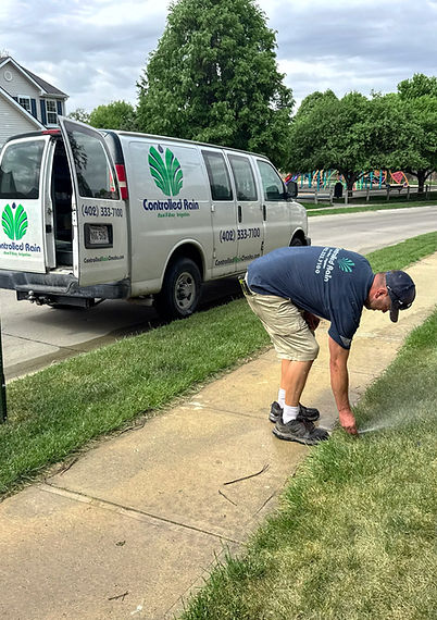 Man Servicing Sprinkler Head