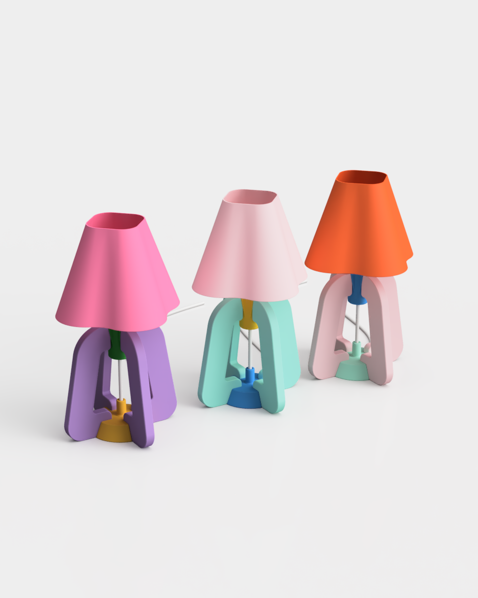 Three colorful Yam Yest Design lamps in a row.