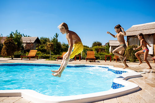 cheerful-children-rejoicing-jumping-swimming-pool (1).jpg