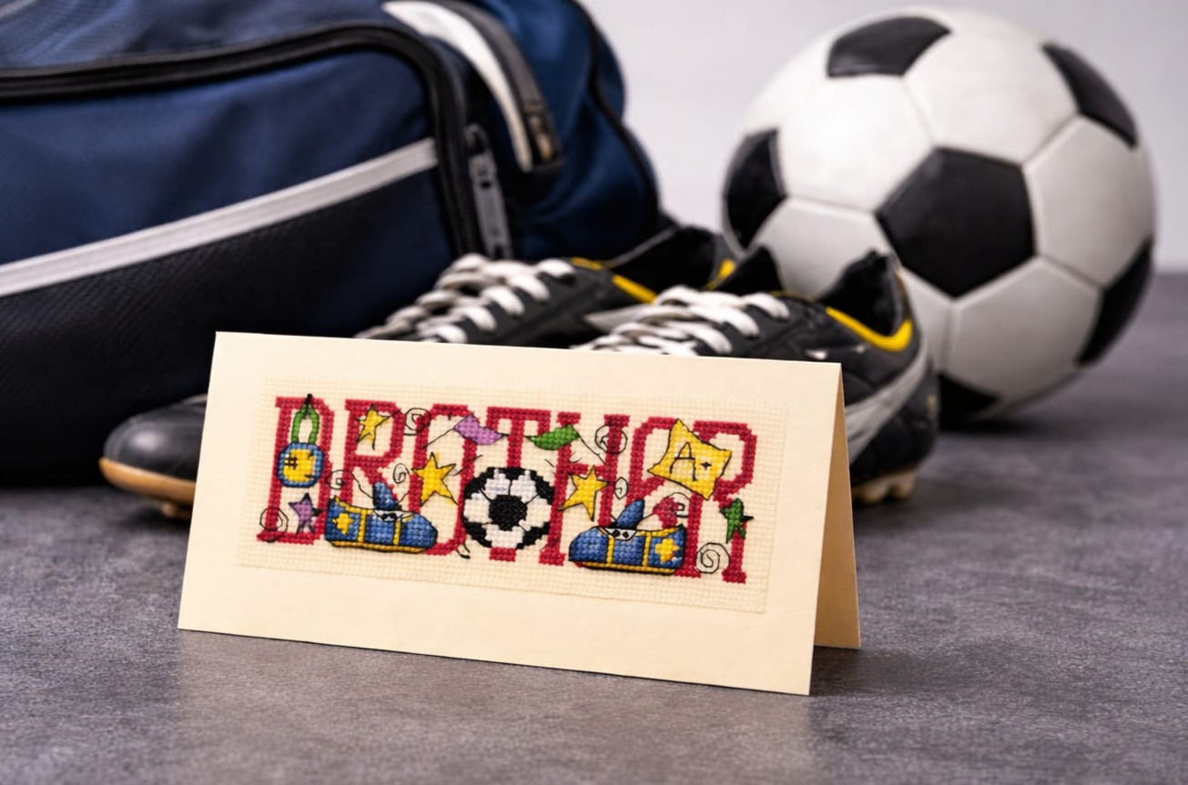 handcrafted card with the word Brother adorned with football items
