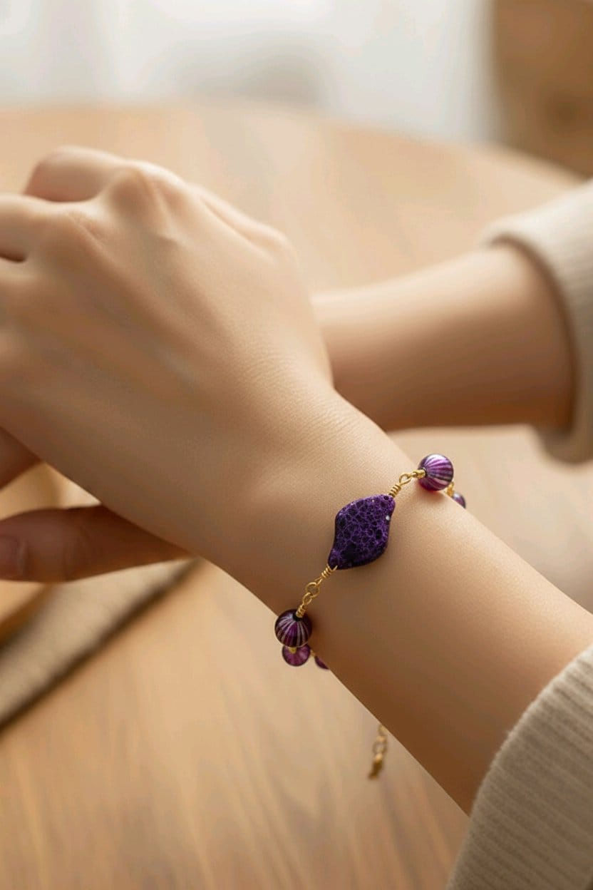 Thumbnail: Handmade wire wrapped bracelet using purple beads