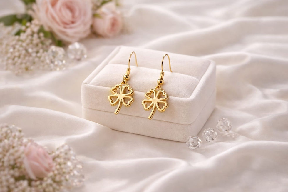 Thumbnail: Handcrafted gold four leaf clover earrings