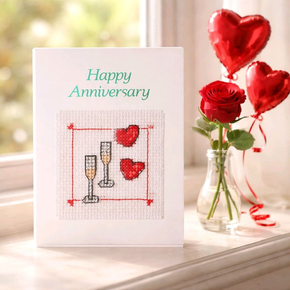 Handcrafted anniversary card of champagne glasses and hearts