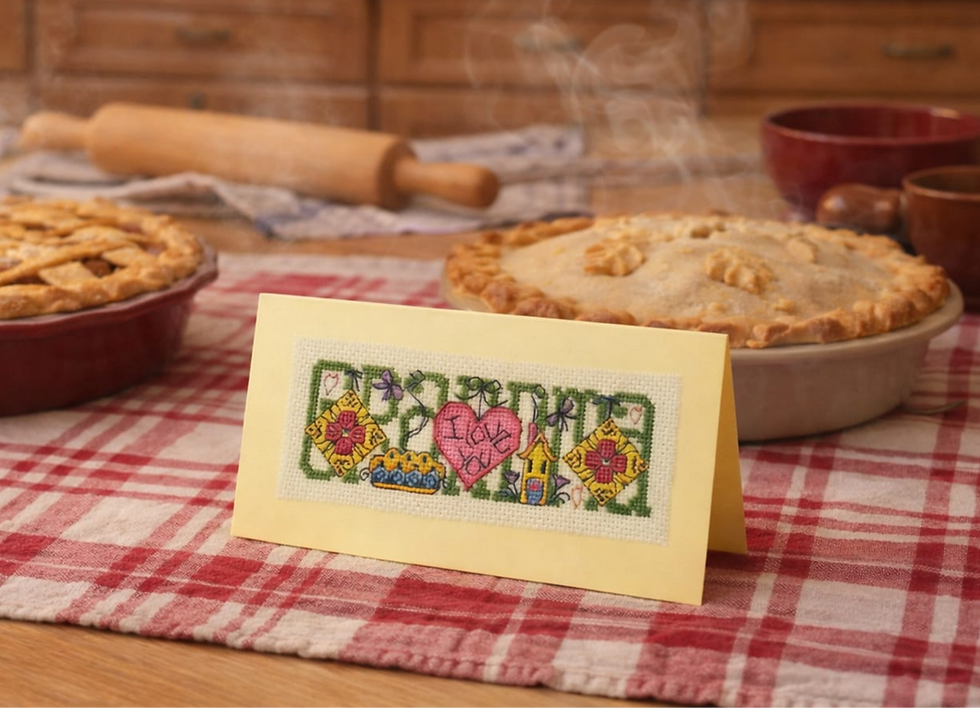 handcrafted card with the word Grandma adorned with pies, stitchery and heart 