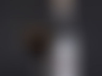 Low sugar Espresso Martini cocktail made with Dapper Barons liqueur, served in a glass next to the bottle