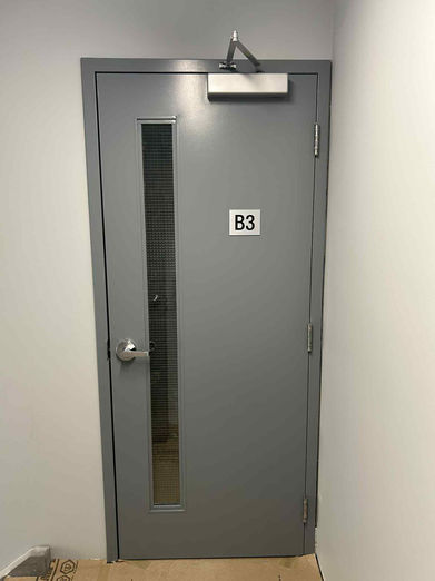 Example of our elegant stairwell sign for our client's new building.