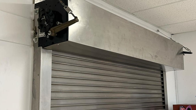 Commercial Cornell Fire Shutter used in a school as a service counter door.