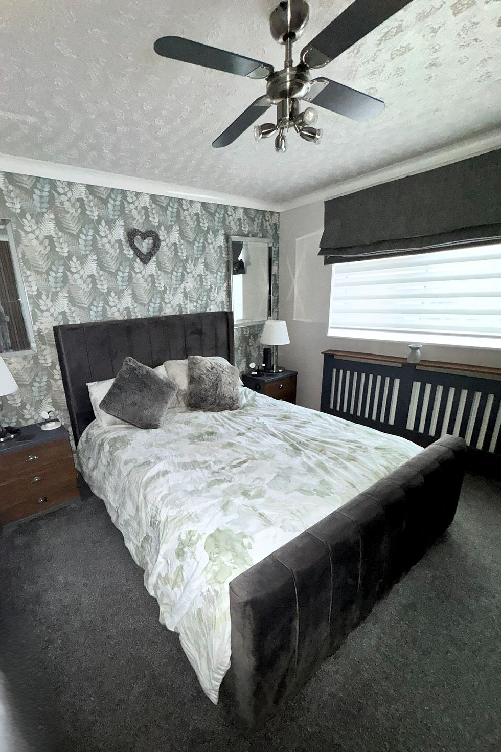 Finished bedroom painting and wallpapering project by Adams Creative Studio