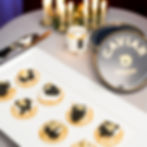 Oscietra caviar blini with cream cheese and edible gold – Brisbane luxury catering.