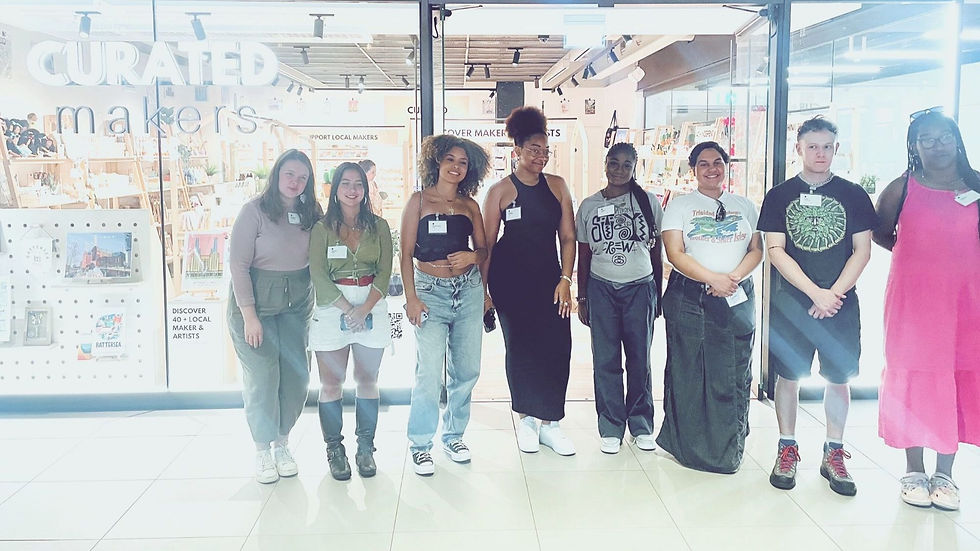 BAC artists standing outside the Curated Makers Store.