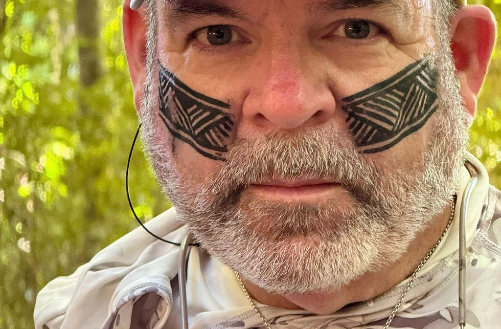 My face was painted by members of the Kayapo tribe... this photo was taken as we walked through the Amazon Rainforest.