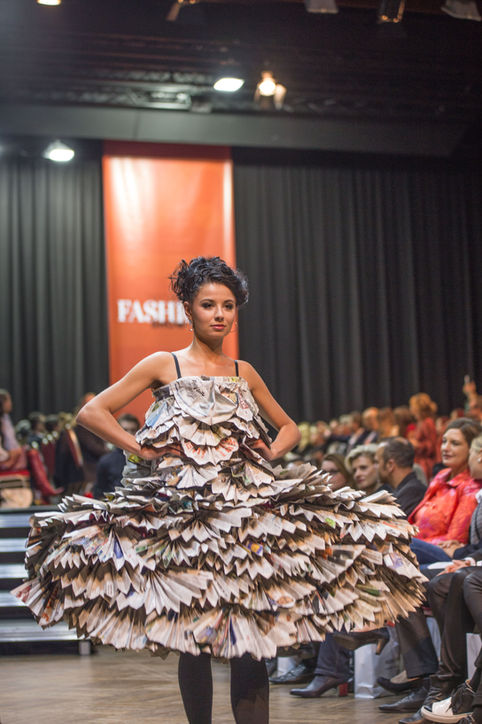 a model walks down the runway at a fashion show