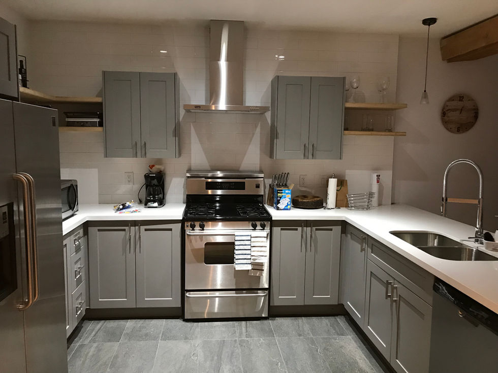 Custom kitchen cabinetry with integrated appliances and finished surfaces