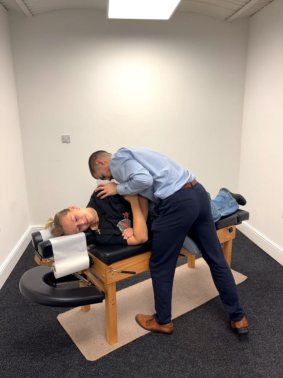 Chiropractor in Tring adjustment for low back pain