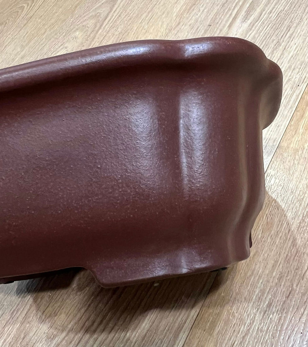 Thumbnail: Rectangular Pot with gently curved sides and raised corners