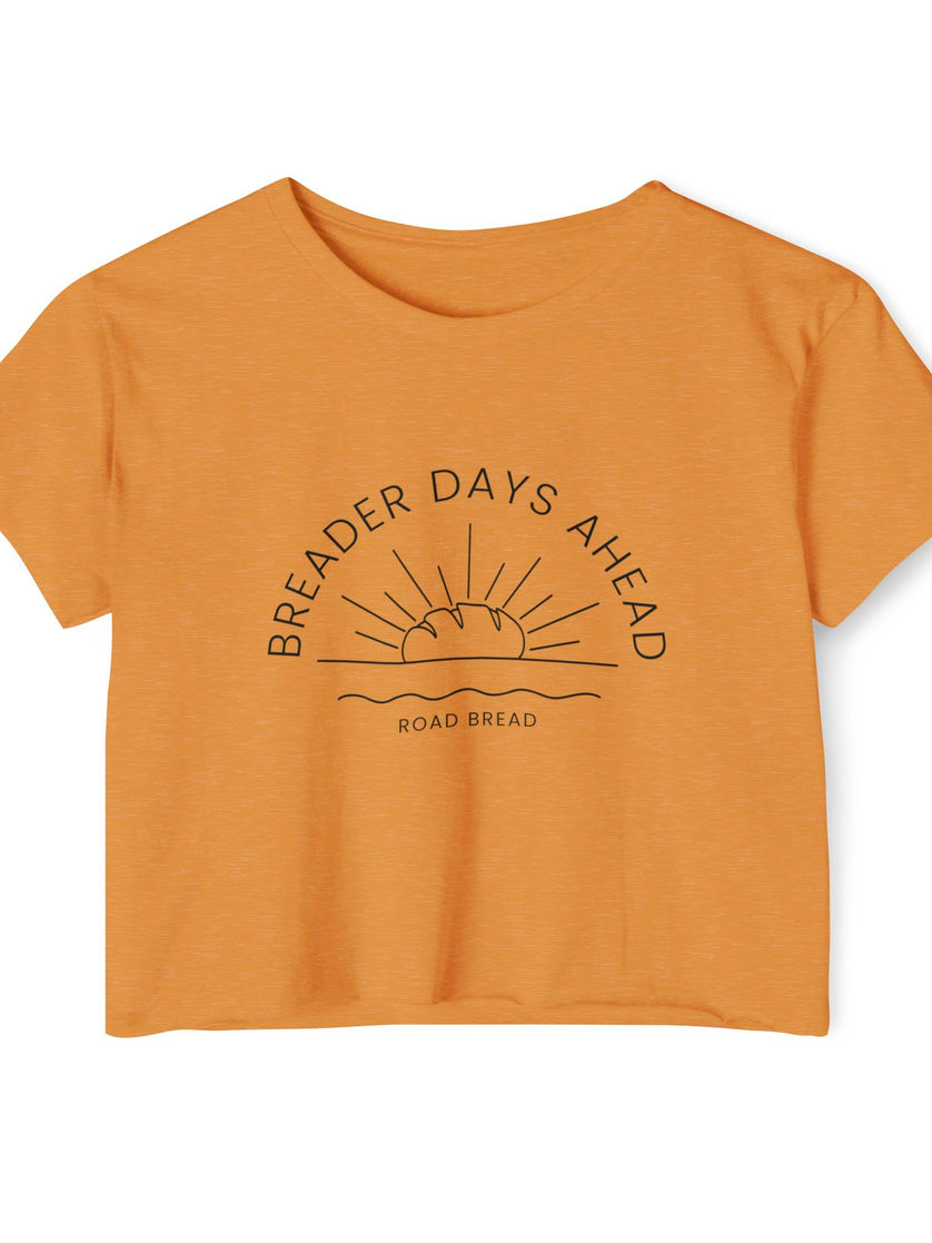 Orange crop top featuring BREADER DAYS AHEAD with a sunrise design.
