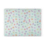 Cutting board with 90s-style bread-themed print on mint grid background featuring colorful pastries and pretzels